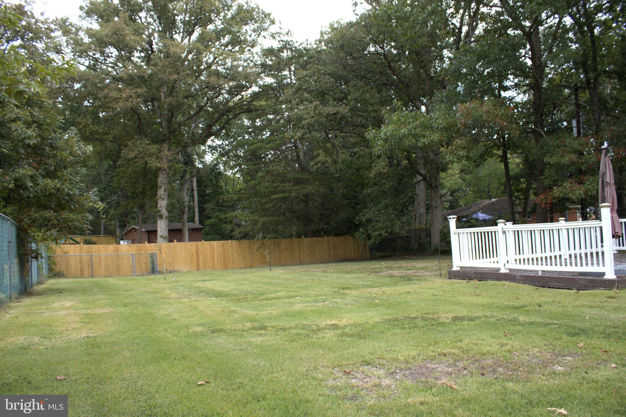 3910 Oaklawn Road Fort Washington, MD 20744 - Photo 15 of 17 a view of a chair and a small yard