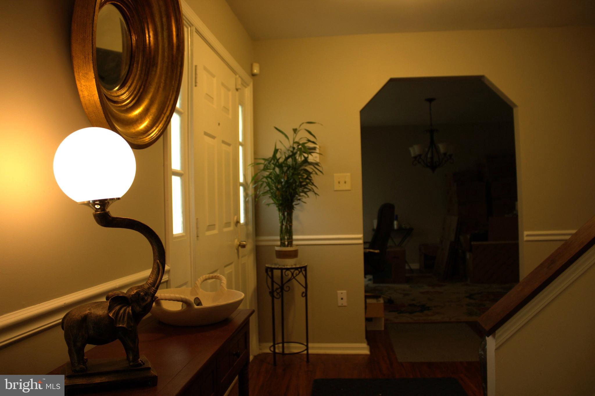 3910 Oaklawn Road Fort Washington, MD 20744 - Photo 3 of 17 a bathroom with a sink and a mirror