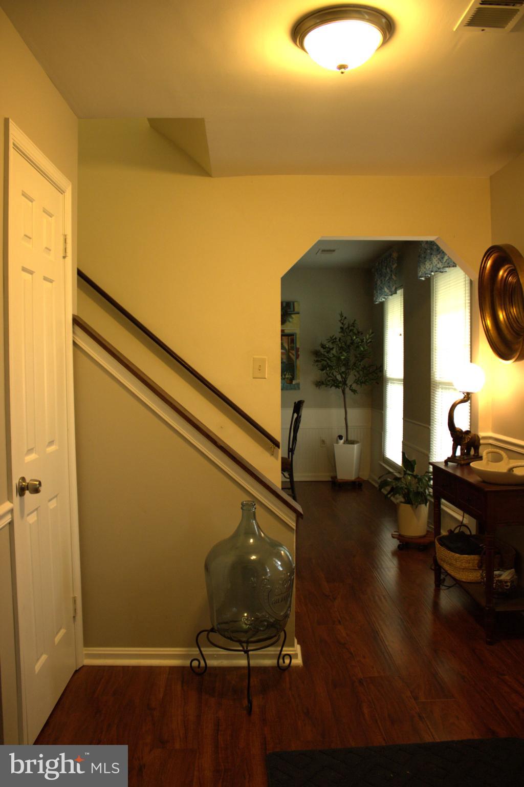 3910 Oaklawn Road Fort Washington, MD 20744 - Photo 4 of 17 a room with wooden floor and furniture