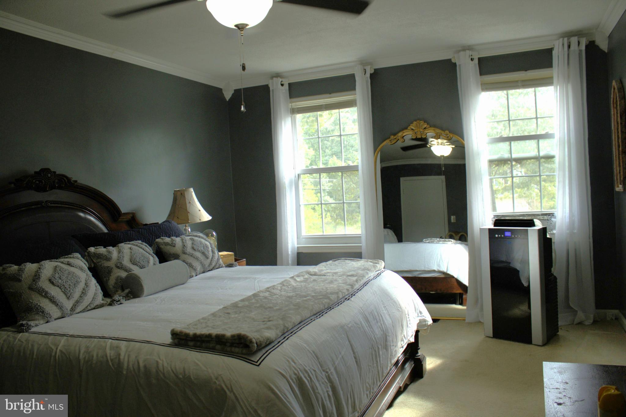 3910 Oaklawn Road Fort Washington, MD 20744 - Photo 10 of 17 a bedroom with bed and a window