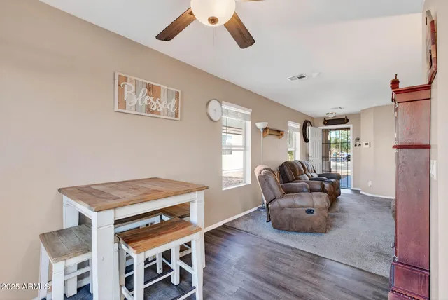 a living room with furniture and a view of living room