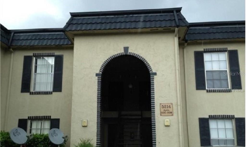 5214 Curry Ford Road, Unit 20 Orlando, FL 32812 - Photo 1 of 1 a close view of a brick house with a outdoor space