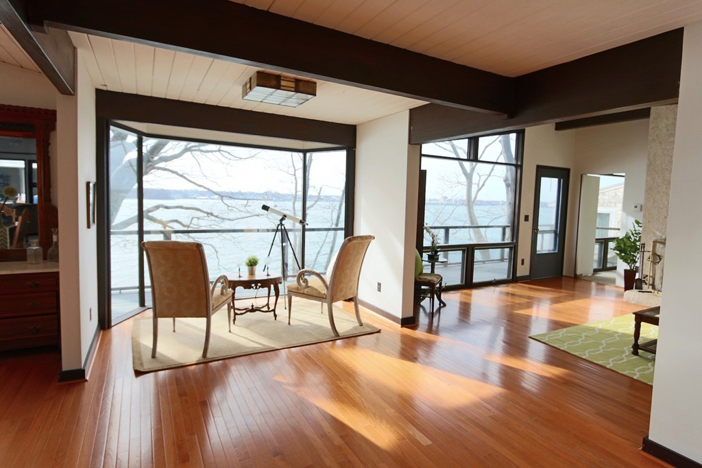 19 Neptune Road Marblehead, MA 01945 - Photo 3 of 16 a living room with furniture and a large window