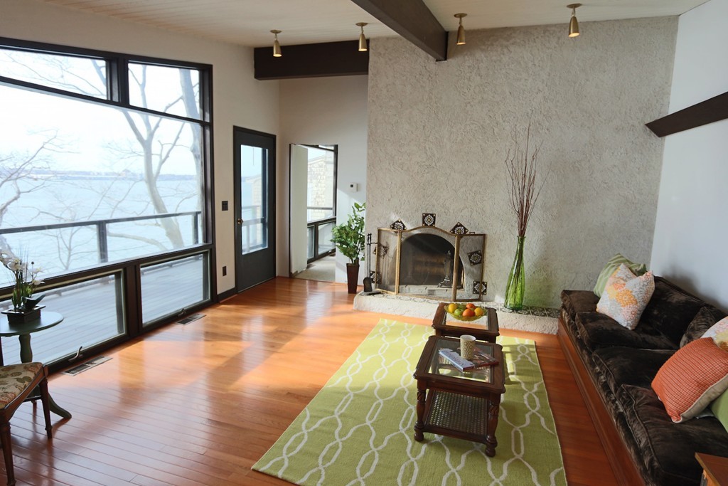19 Neptune Road Marblehead, MA 01945 - Photo 8 of 16 a living room with furniture and a wooden floor