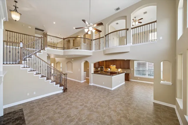 a view of entryway and hall with a front door