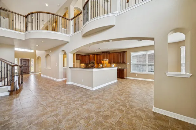 a view of an entryway with a kitchen