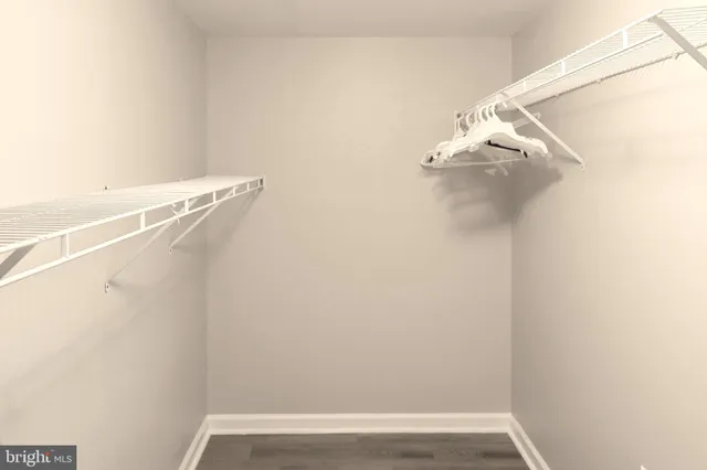 a view of a room with racks on the wall