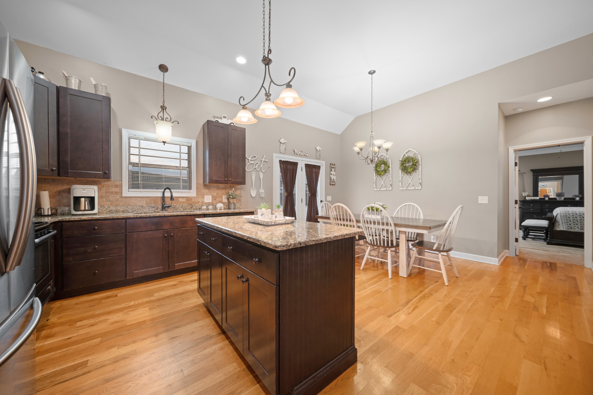 1934 Hygeia Road Greenbrier, TN 37073 - Photo 14 of 36 a kitchen with granite countertop a sink appliances and cabinets