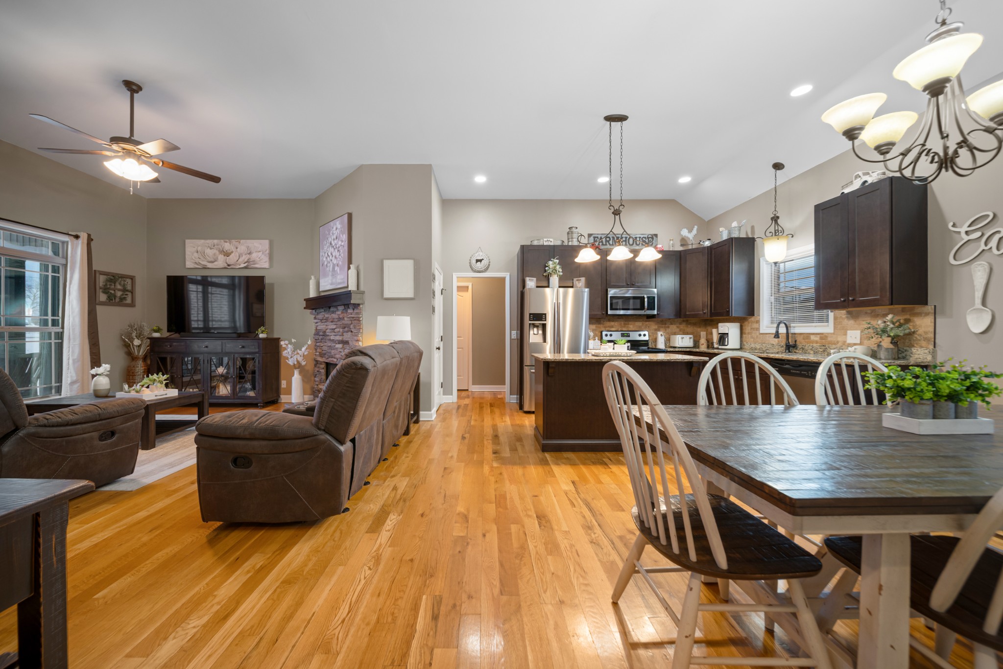 1934 Hygeia Road Greenbrier, TN 37073 - Photo 18 of 36 a living room with furniture kitchen view and a wooden floor