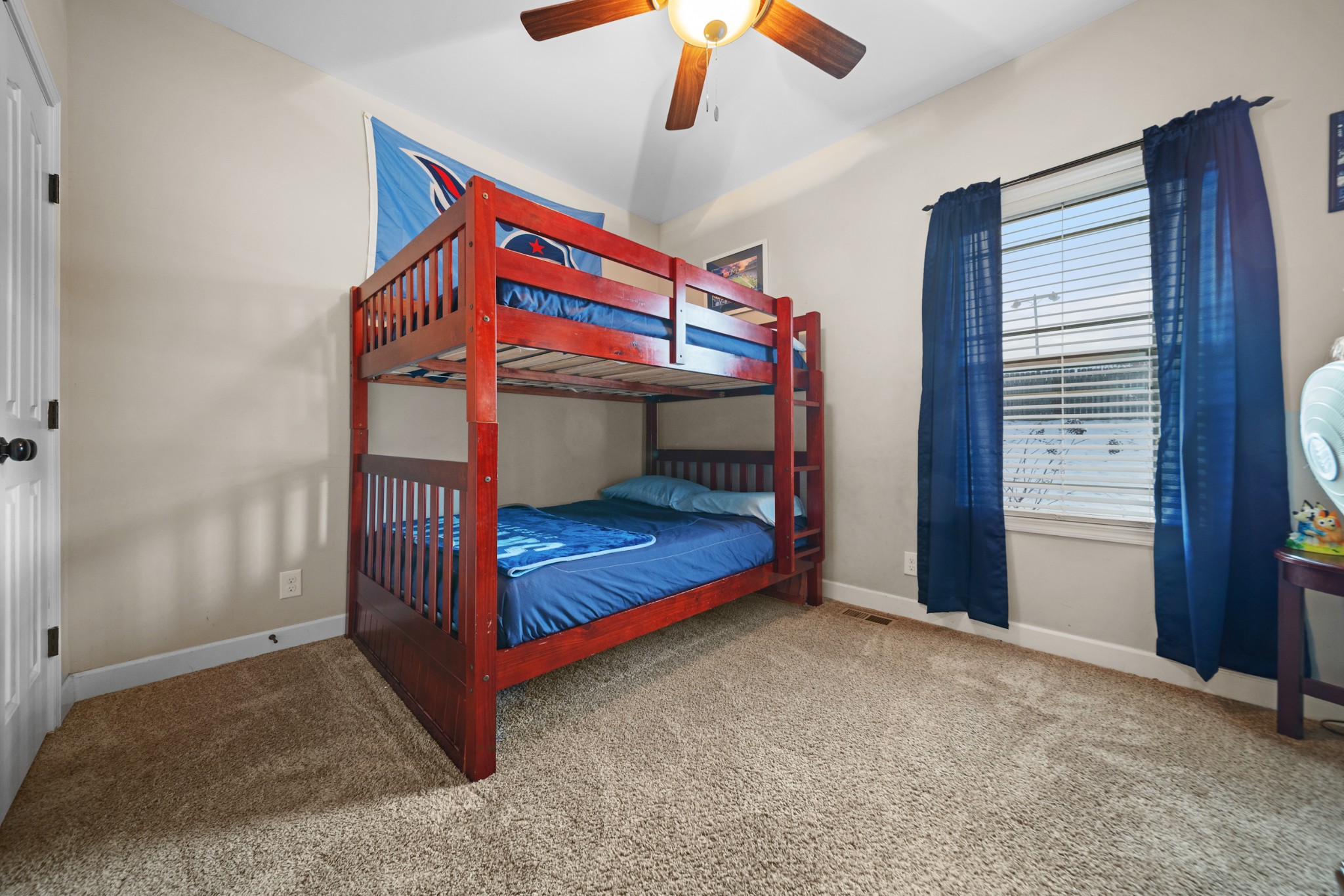 1934 Hygeia Road Greenbrier, TN 37073 - Photo 20 of 36 a bedroom with a bed and a chandelier