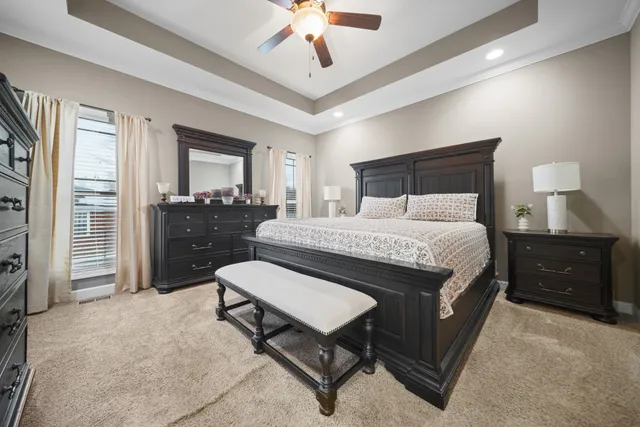 a living room with furniture and a gym equipment