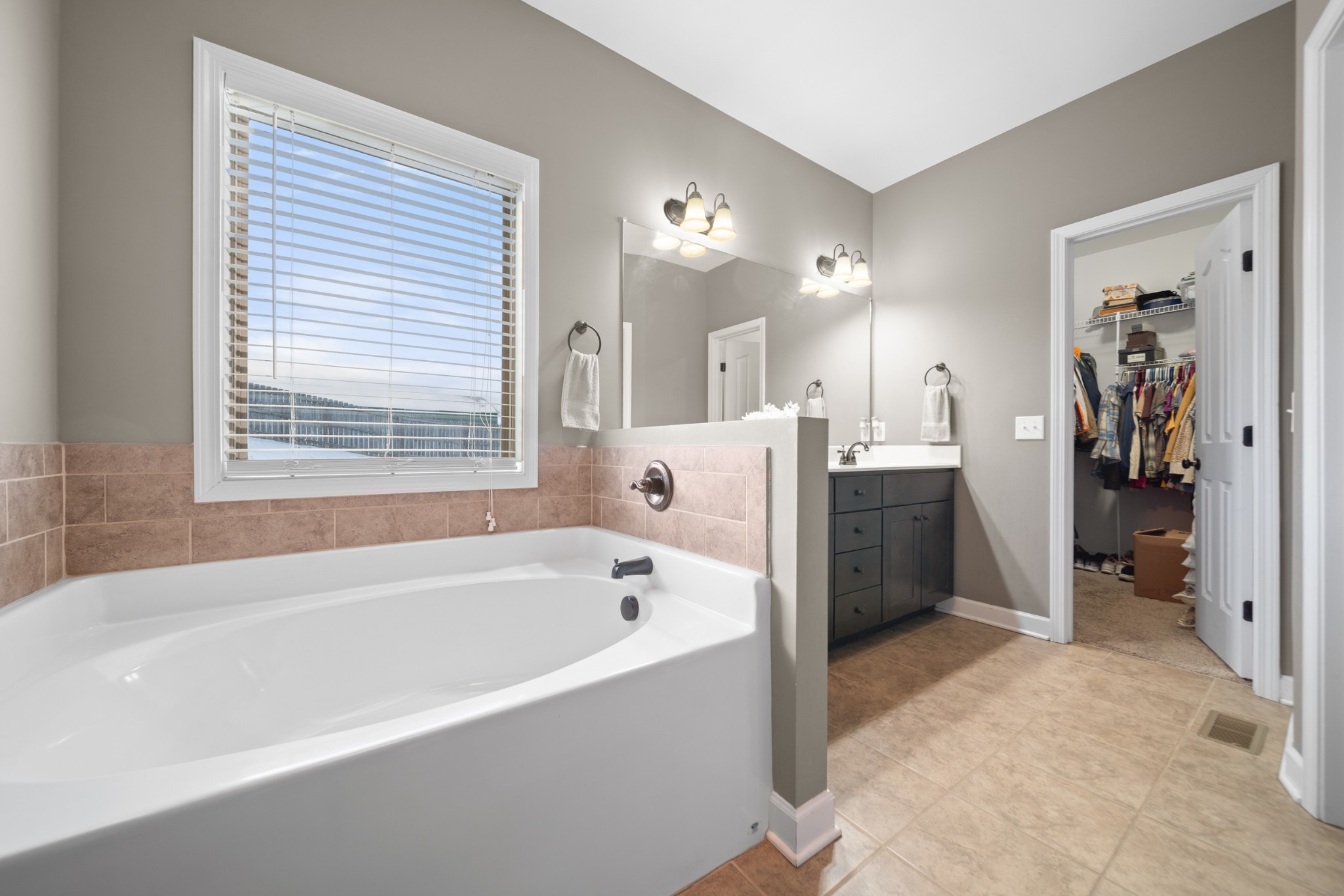 1934 Hygeia Road Greenbrier, TN 37073 - Photo 26 of 36 a bathroom with a bathtub and a sink