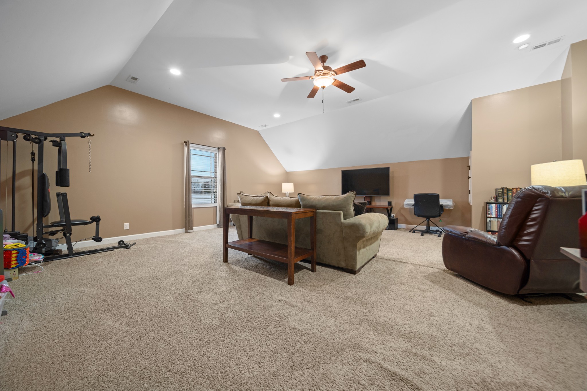 1934 Hygeia Road Greenbrier, TN 37073 - Photo 30 of 36 a living room with furniture and a gym equipment