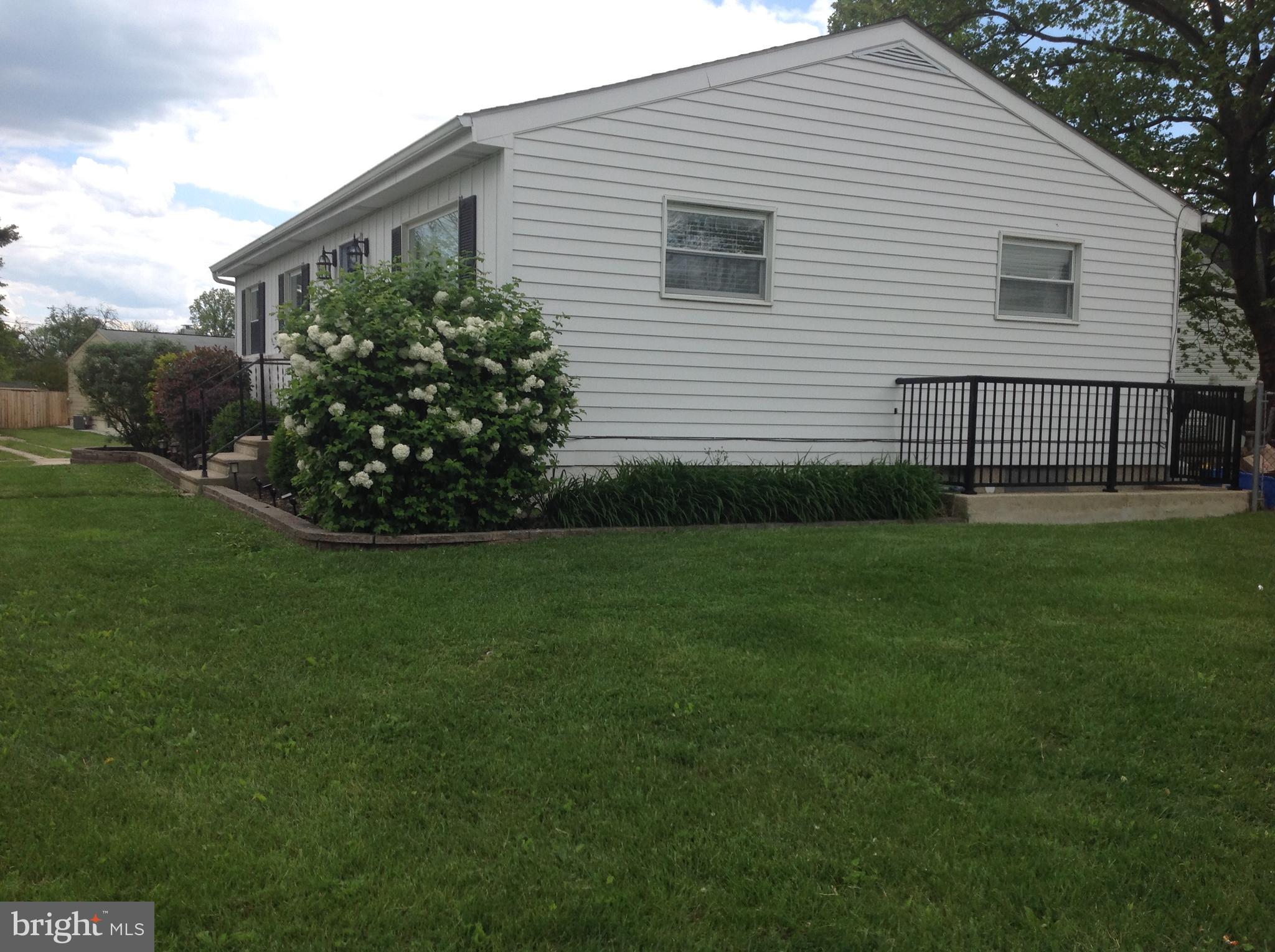 1333 Westburn Road Baltimore, MD 21228 - Photo 3 of 32 Landscaped side at basement entry