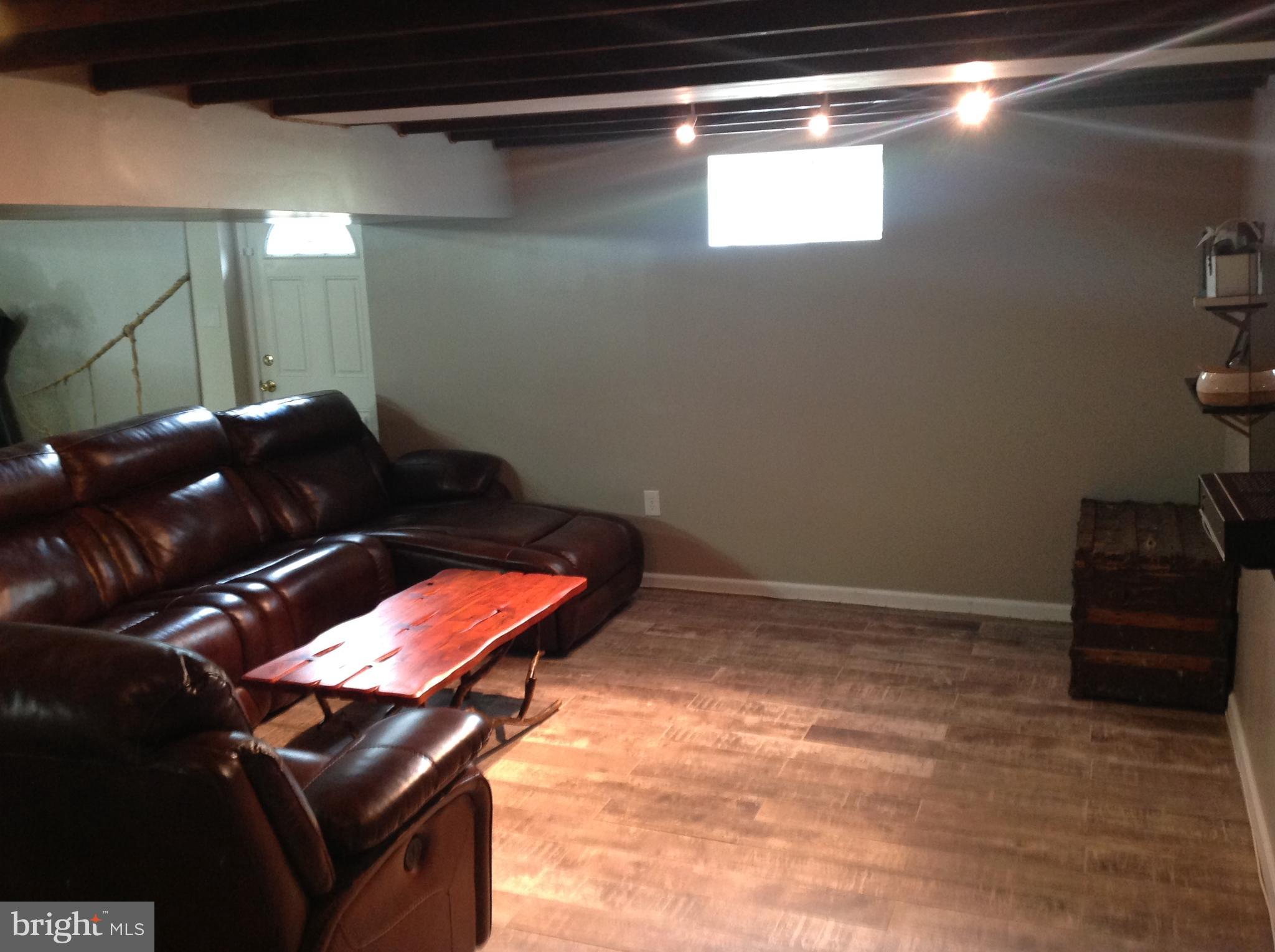 1333 Westburn Road Baltimore, MD 21228 - Photo 28 of 32 Beyond couch is the door to exist outside