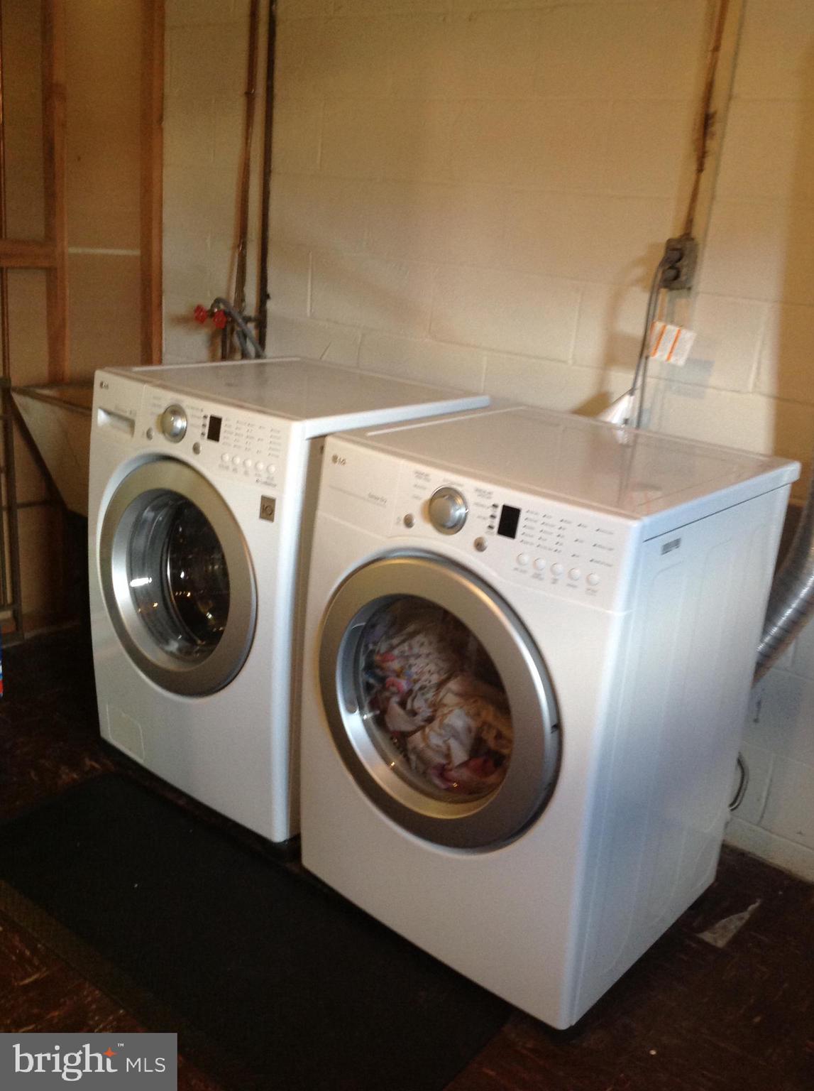 1333 Westburn Road Baltimore, MD 21228 - Photo 31 of 32 Full size washer and dryer next to laundry tub