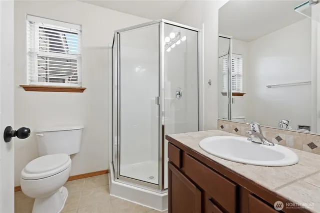 a view of a hallway with closet area