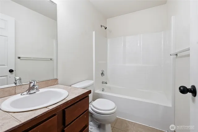 a view of a hallway with a white walls