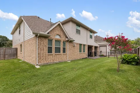 a view of a backyard with potted plants