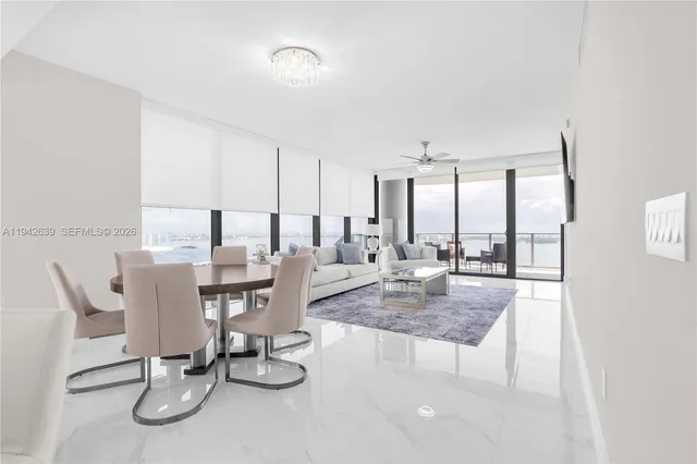 a view of a kitchen with a sink and faucet