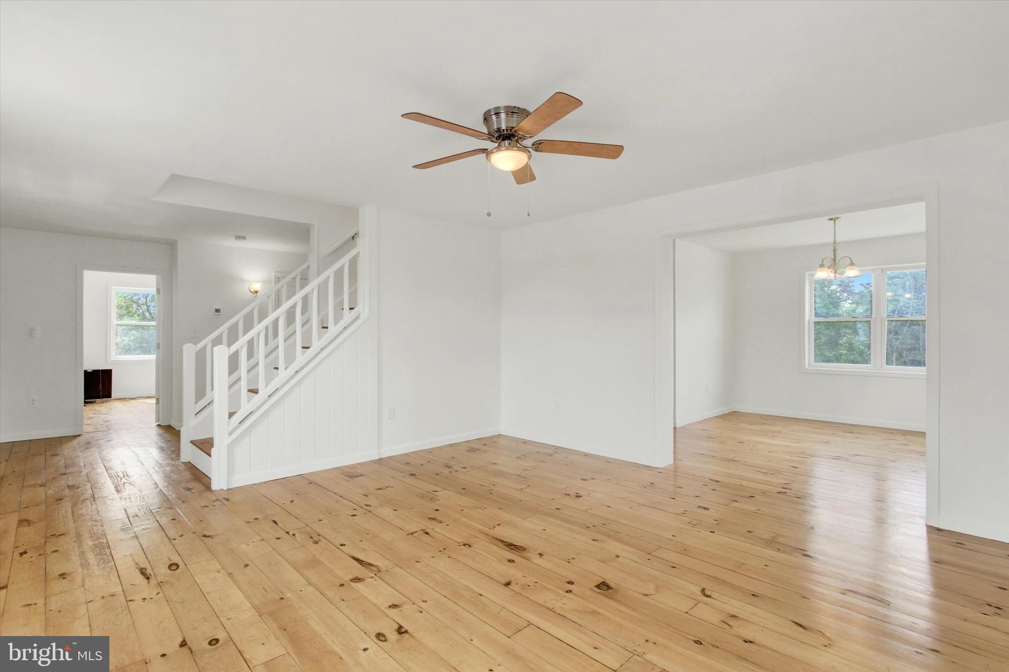 651 Alexander Spring Road Carlisle, PA 17015 - Photo 12 of 28 a view of empty room with wooden floor and fan