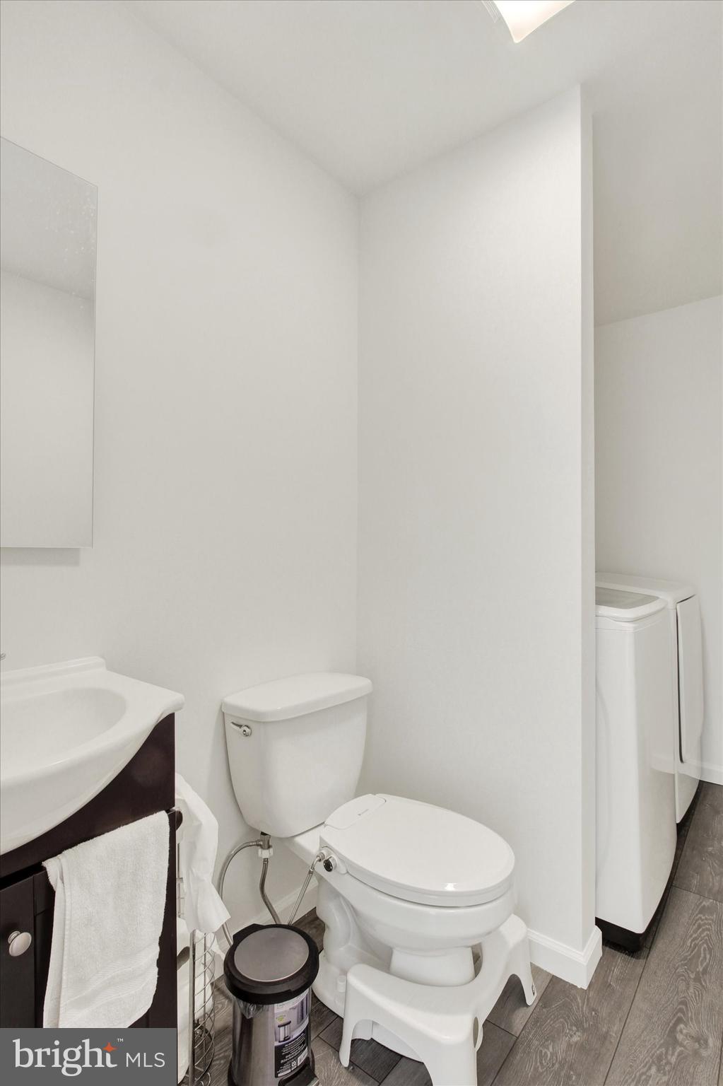 651 Alexander Spring Road Carlisle, PA 17015 - Photo 24 of 28 a white toilet sitting next to a white sink and vanity