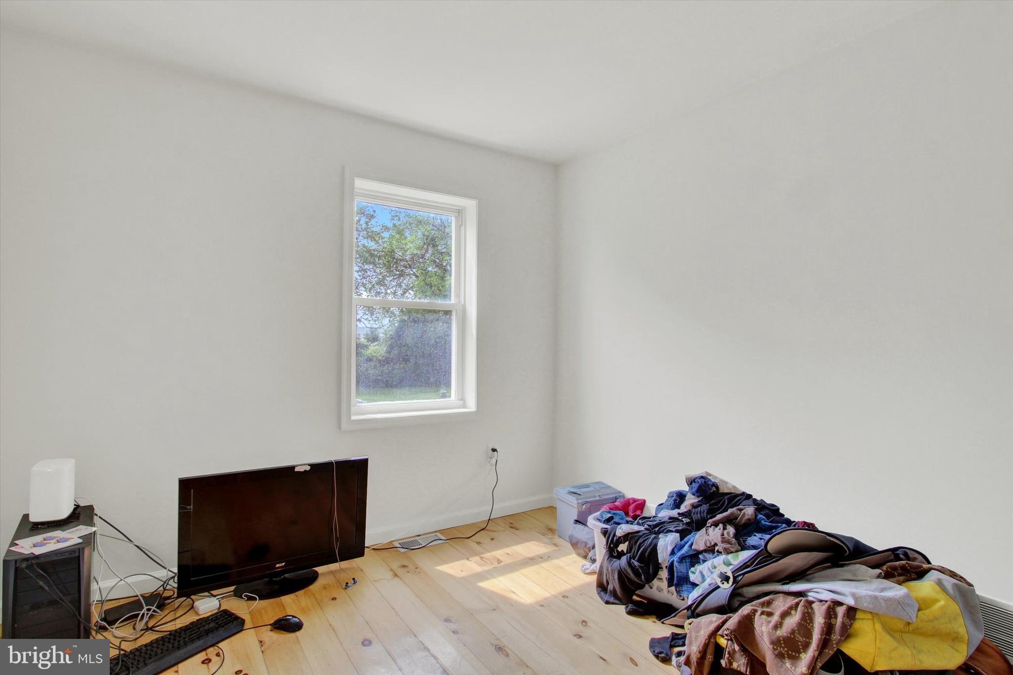 651 Alexander Spring Road Carlisle, PA 17015 - Photo 25 of 28 a bedroom with a bed and a window