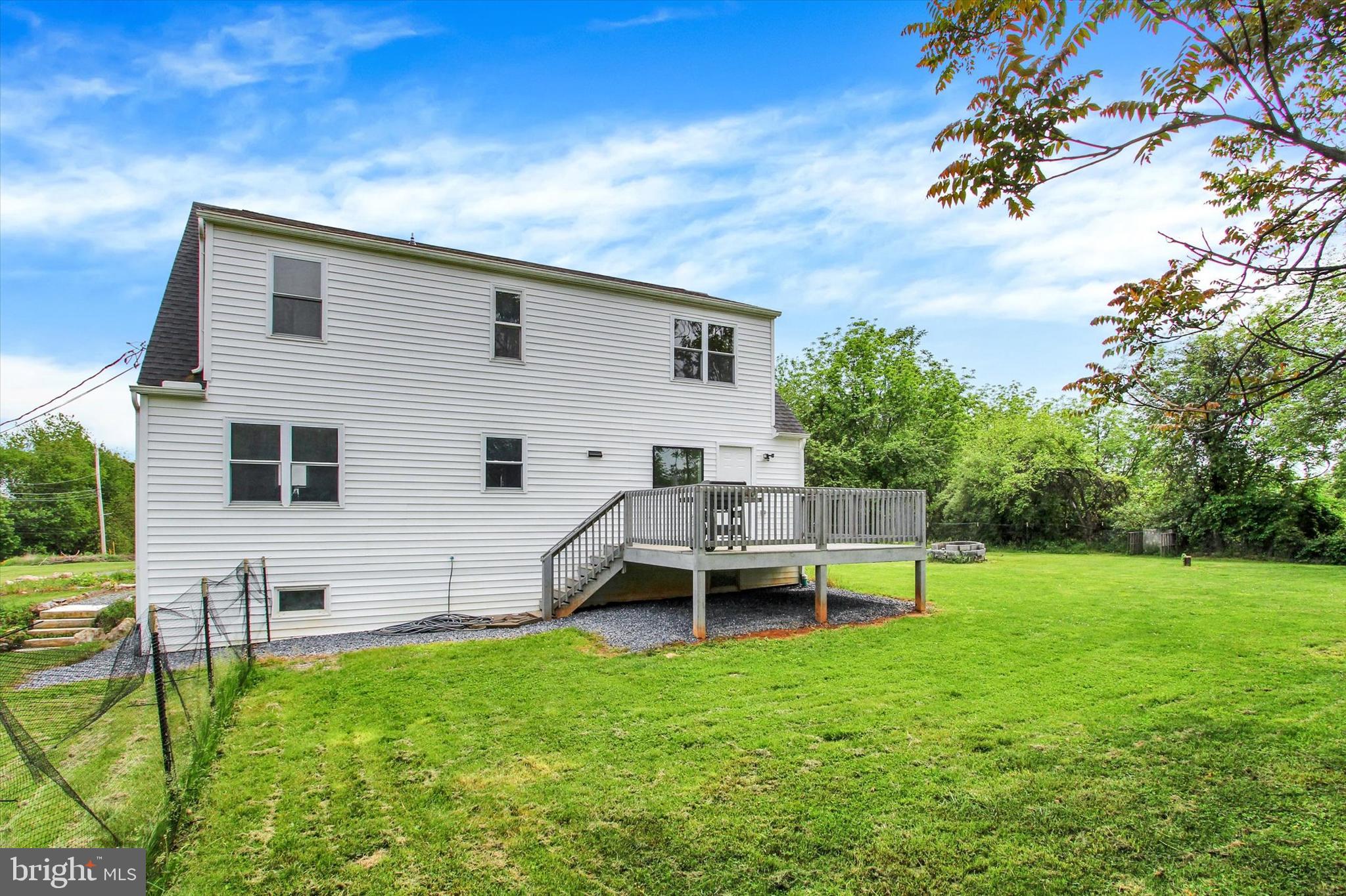 651 Alexander Spring Road Carlisle, PA 17015 - Photo 5 of 28 a view of a house with backyard