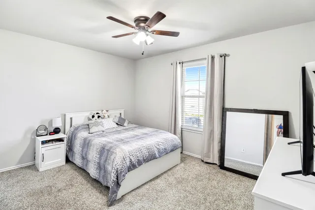 a view of a deck with a backyard