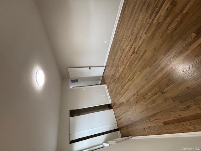 219-07 74th Avenue, Unit 447B2 Queens, NY 11364 - Photo 11 of 15 a view of an empty room and wooden floor