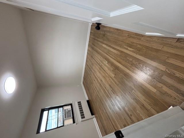 219-07 74th Avenue, Unit 447B2 Queens, NY 11364 - Photo 13 of 15 wooden floor in a hall with an entryway