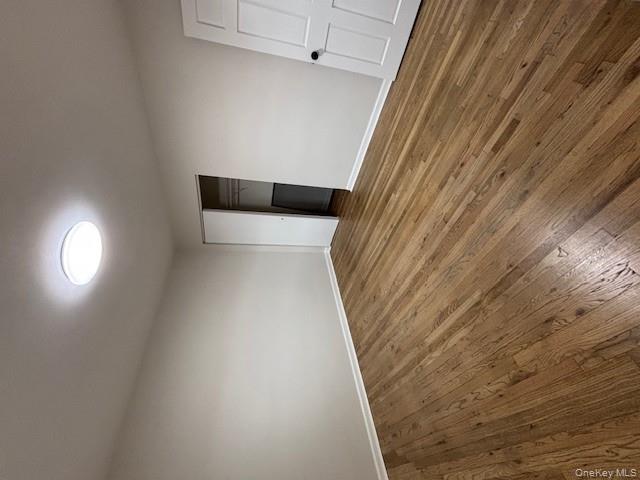 219-07 74th Avenue, Unit 447B2 Queens, NY 11364 - Photo 14 of 15 wooden floor in a room