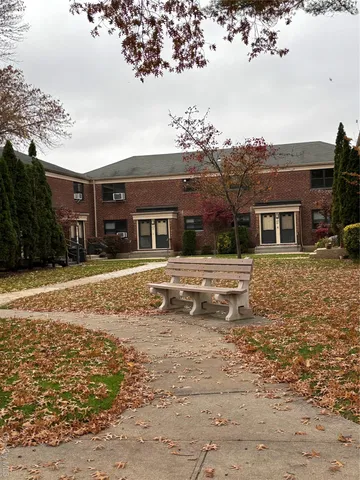 a house view with a backyard space