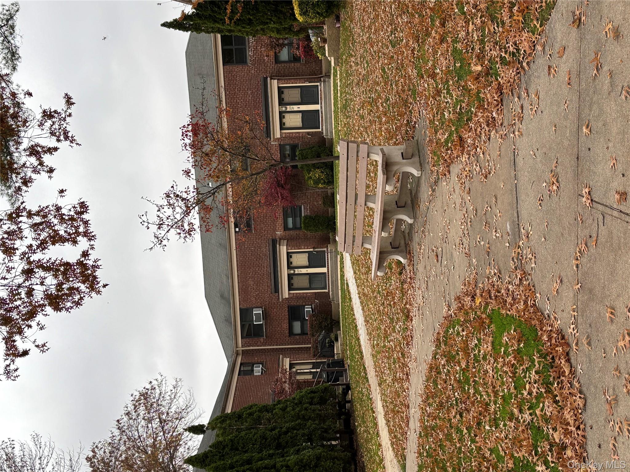 219-07 74th Avenue, Unit 447B2 Queens, NY 11364 - Photo 2 of 15 a house view with a backyard space