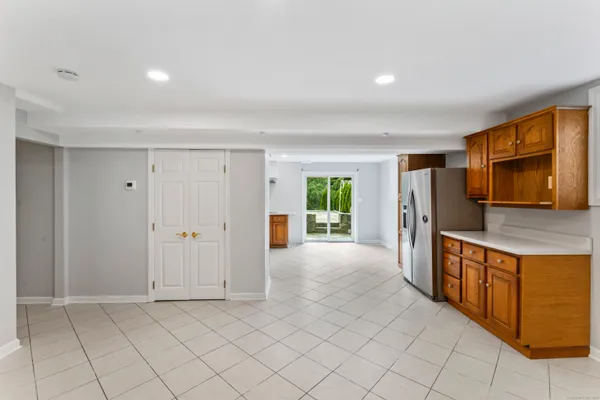 a view of a kitchen with furniture and a window
