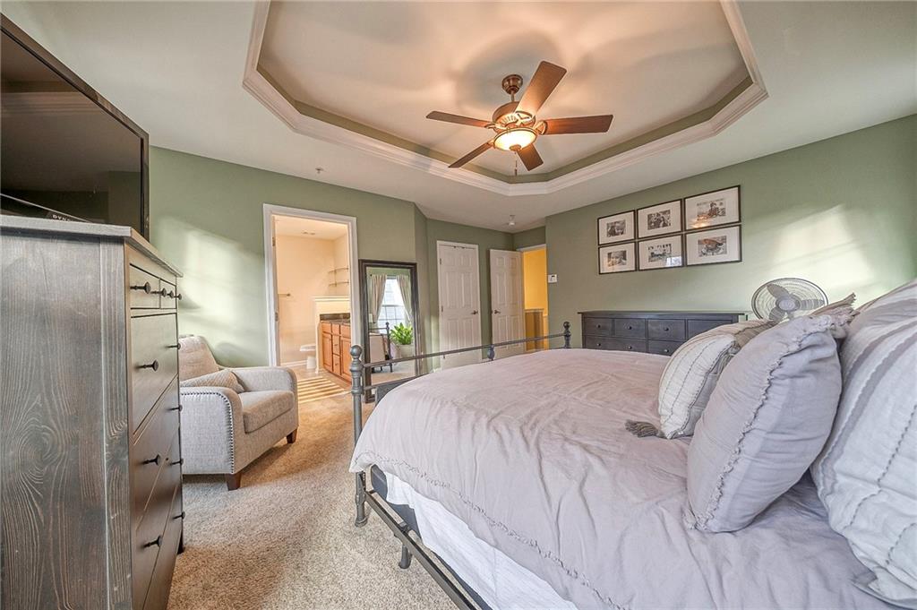 204 Broadstone Drive Mars, PA 16046 - Photo 15 of 32 a bedroom with a bed and ceiling fan