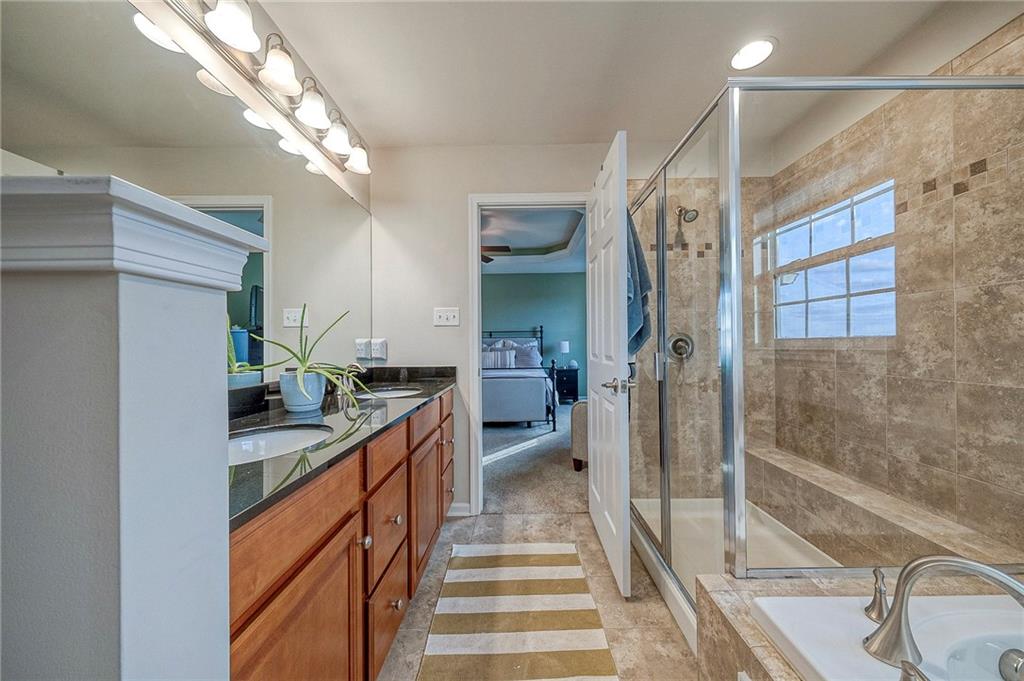 204 Broadstone Drive Mars, PA 16046 - Photo 17 of 32 a kitchen with granite countertop a sink and cabinets