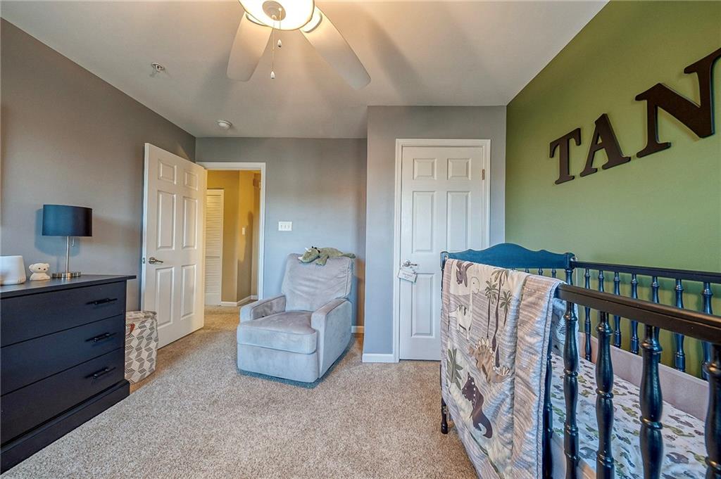 204 Broadstone Drive Mars, PA 16046 - Photo 19 of 32 a living room with furniture and a flat screen tv