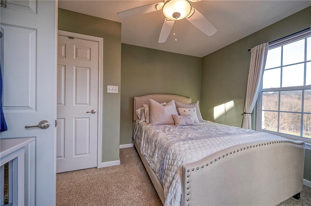 204 Broadstone Drive Mars, PA 16046 - Photo 21 of 32 a bedroom with a bed and a window