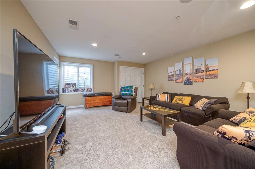 204 Broadstone Drive Mars, PA 16046 - Photo 24 of 32 a living room with furniture and a window