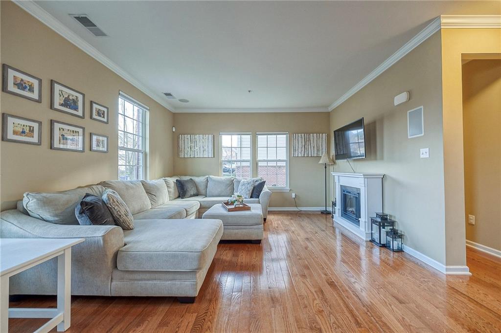 204 Broadstone Drive Mars, PA 16046 - Photo 3 of 32 a living room with furniture and a fireplace