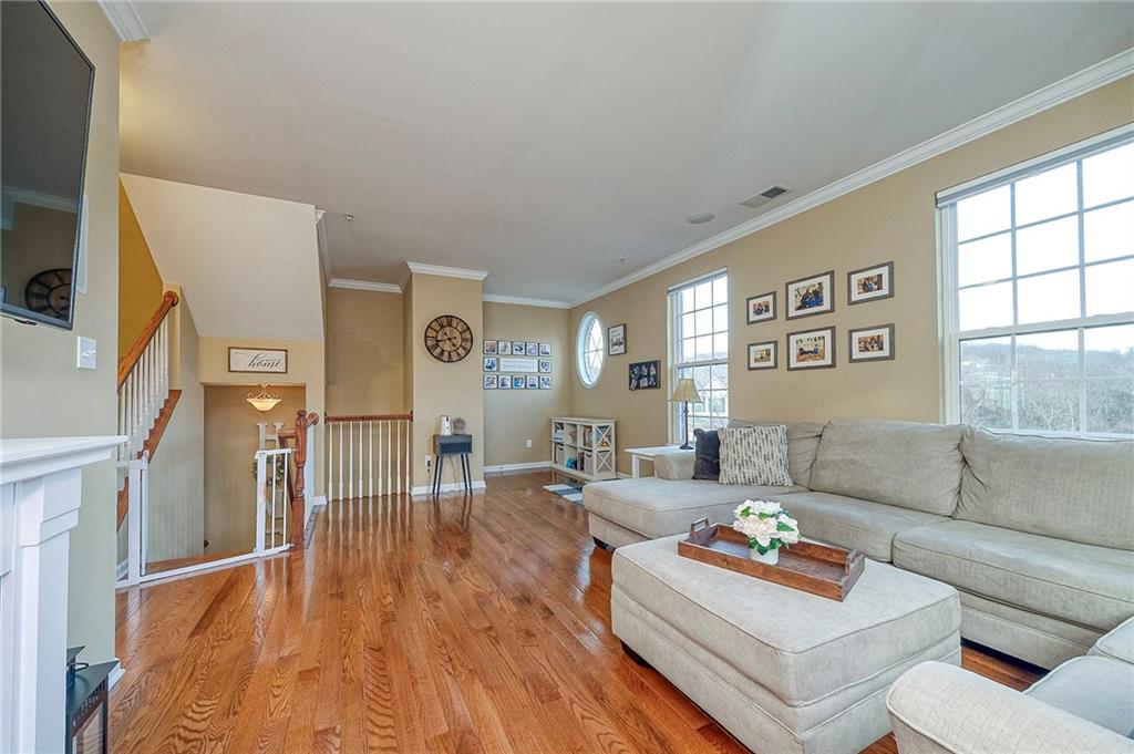 204 Broadstone Drive Mars, PA 16046 - Photo 4 of 32 a living room with furniture and a flat screen tv