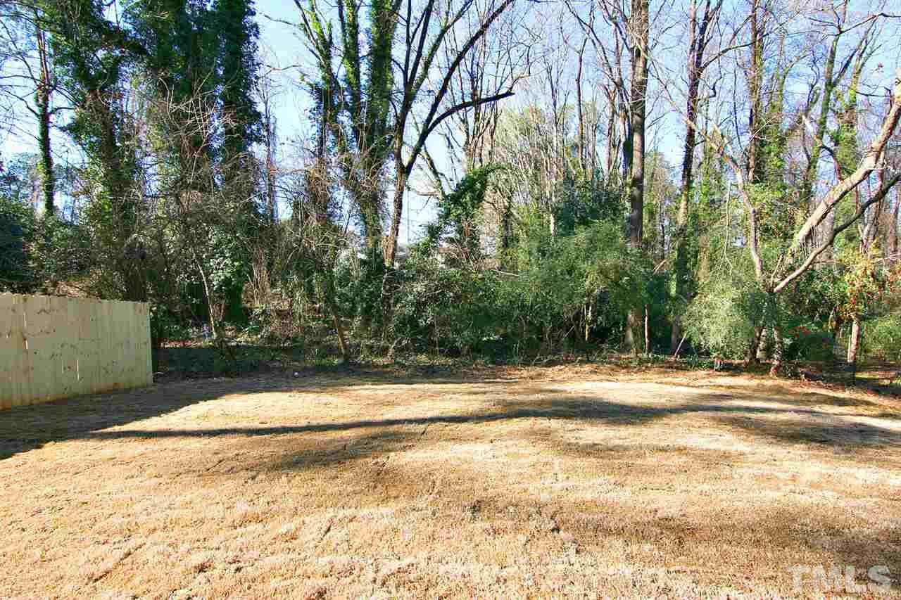 915 Marilyn Drive Raleigh, NC 27607 - Photo 4 of 25 a view of a yard with trees