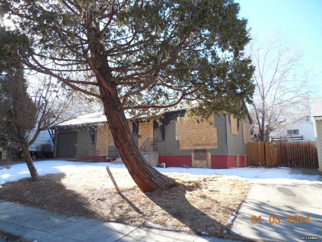 855 Stoker Avenue Reno, NV 89503 - Photo 1 of 1 a front view of a house with a yard