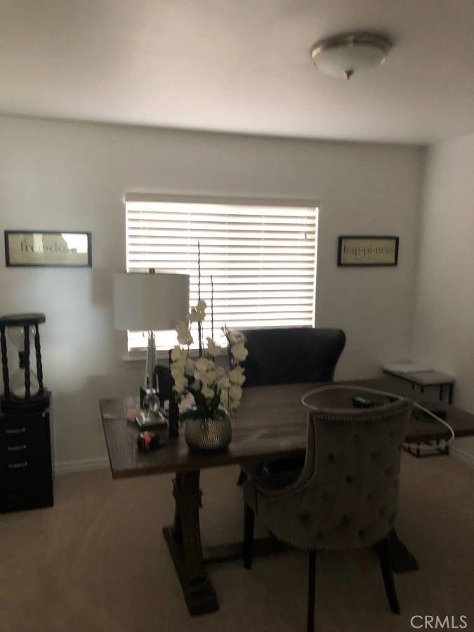 14653 Meadowsweet Drive Eastvale, CA 92880 - Photo 8 of 15 a reading room with furniture and a window