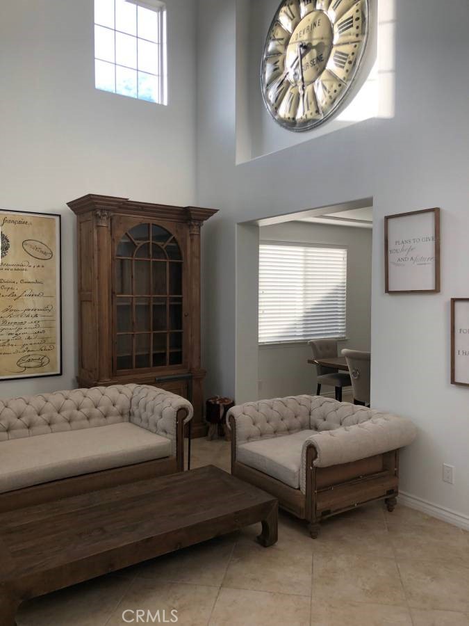 14653 Meadowsweet Drive Eastvale, CA 92880 - Photo 10 of 15 a bedroom with a bed and window