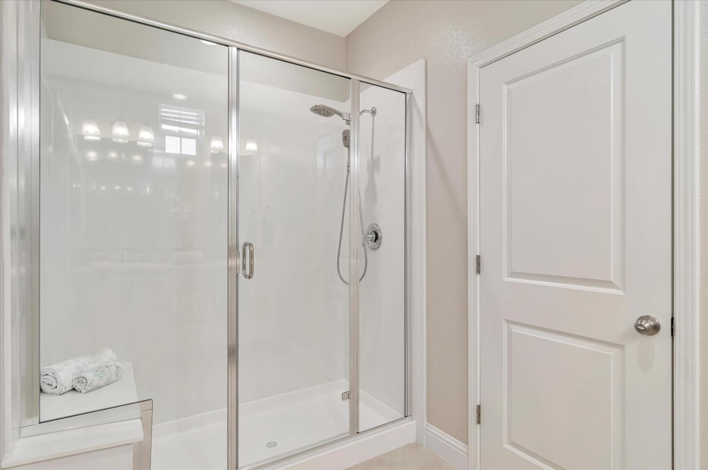 305 Wild Rose Way Milpitas, CA 95035 - Photo 14 of 41 a bathroom with a glass shower door