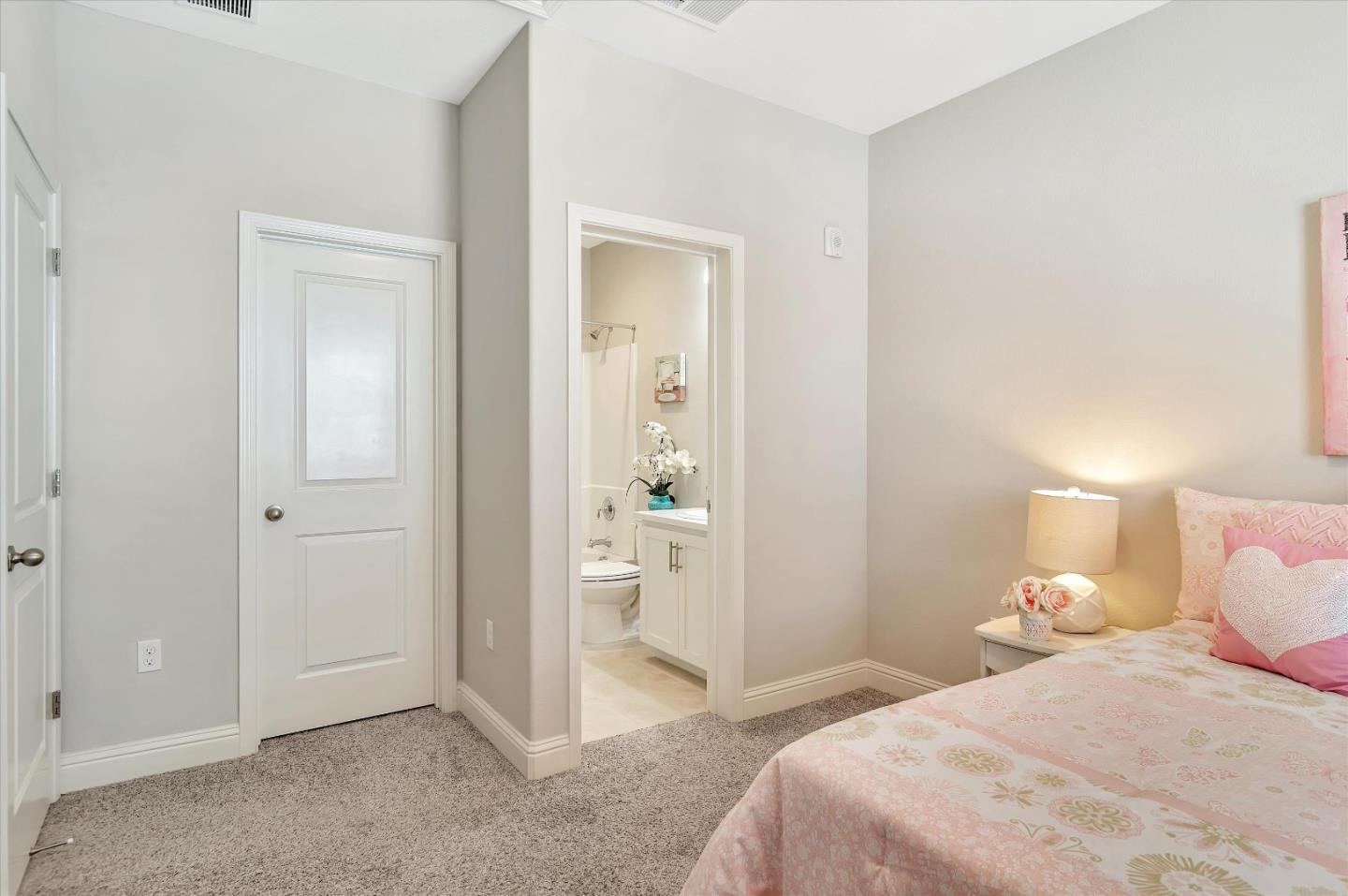 305 Wild Rose Way Milpitas, CA 95035 - Photo 18 of 41 a bedroom with a bed and a mirror