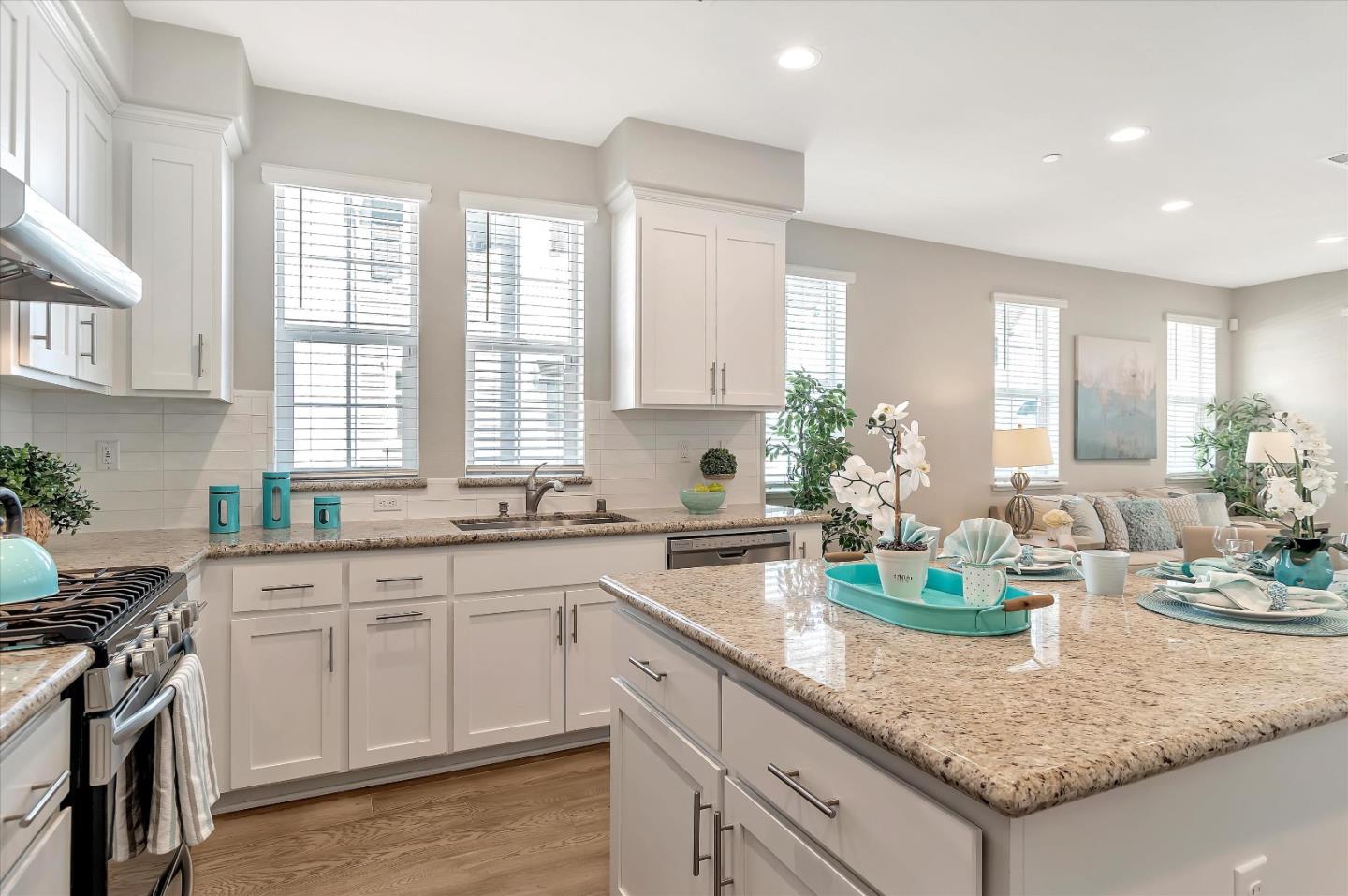 305 Wild Rose Way Milpitas, CA 95035 - Photo 2 of 41 a kitchen with sink and cabinets