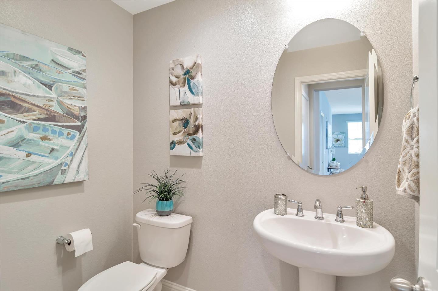 305 Wild Rose Way Milpitas, CA 95035 - Photo 24 of 41 a bathroom with a toilet a sink and a mirror
